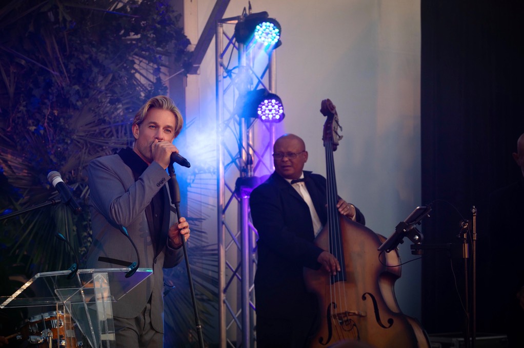 International Singer Ike Moriz corporate entertainment swing band Cape Town Johannesburg Stellenbosch Mediclinic launch 2019 double bass stage show